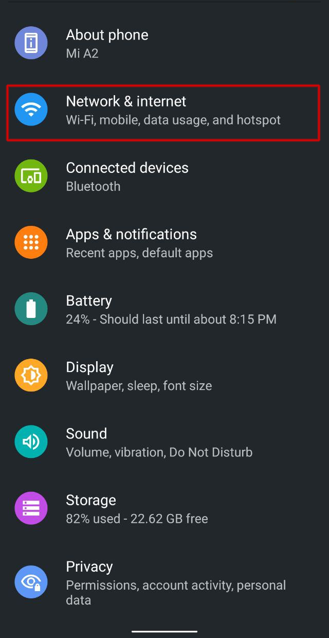 Smartphone with Settings app opened, signifying the starting point for setting up a Wi-Fi hotspot on Android.
