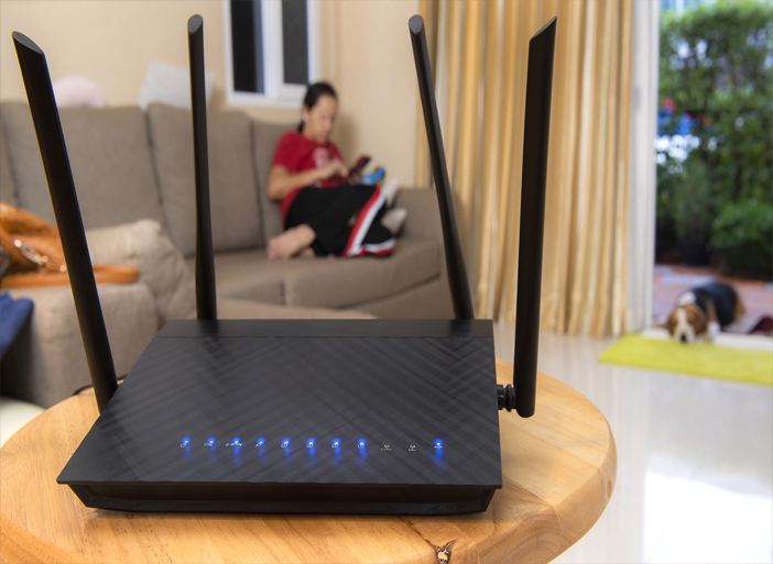 Wi-Fi router strategically placed in an open area, surrounded by connected devices, emphasizing optimal placement for enhanced performance.