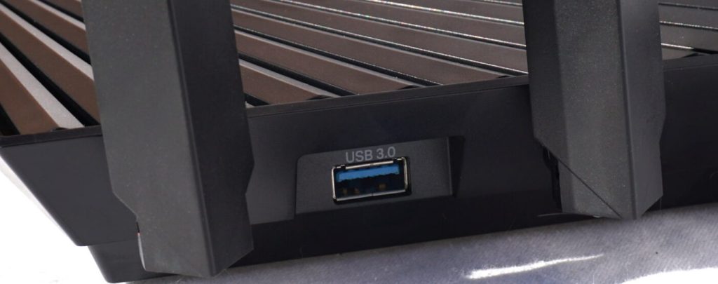 Side view of the TP-Link Archer AX90 router showing the USB-A 3.2 port.
